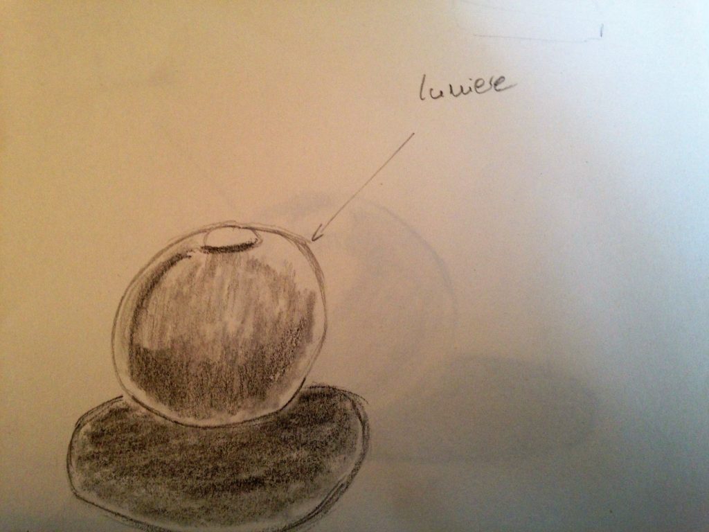 Pomme avec lumière venant de la droite