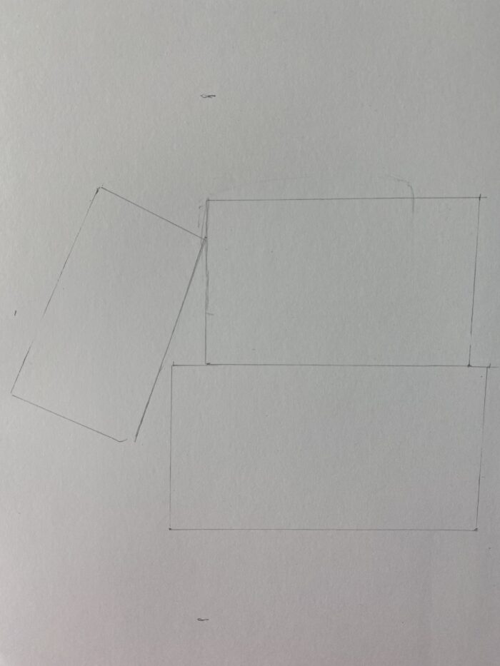 Dessin en cours : Esquisse des contours de base pour un macaron. Utilisation d'un crayon HB sur du papier à dessin blanc.