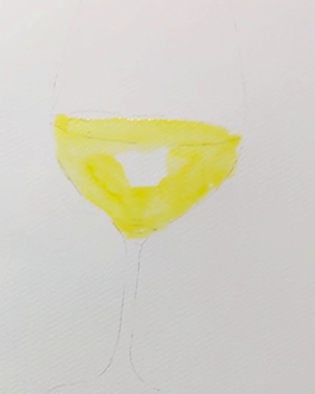 Premier lavis jaune d'un verre de vin à l'aquarelle, avec un carré de papier blanc laissé intact